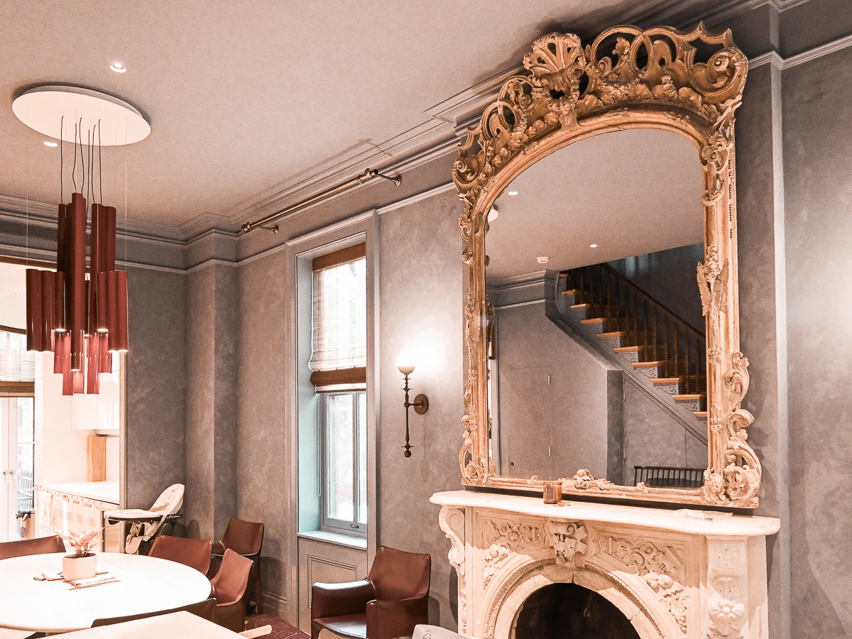 Luxury apartment interior with ornate fireplace and gilded mirror - ZS NY Improvement renovation in Manhattan